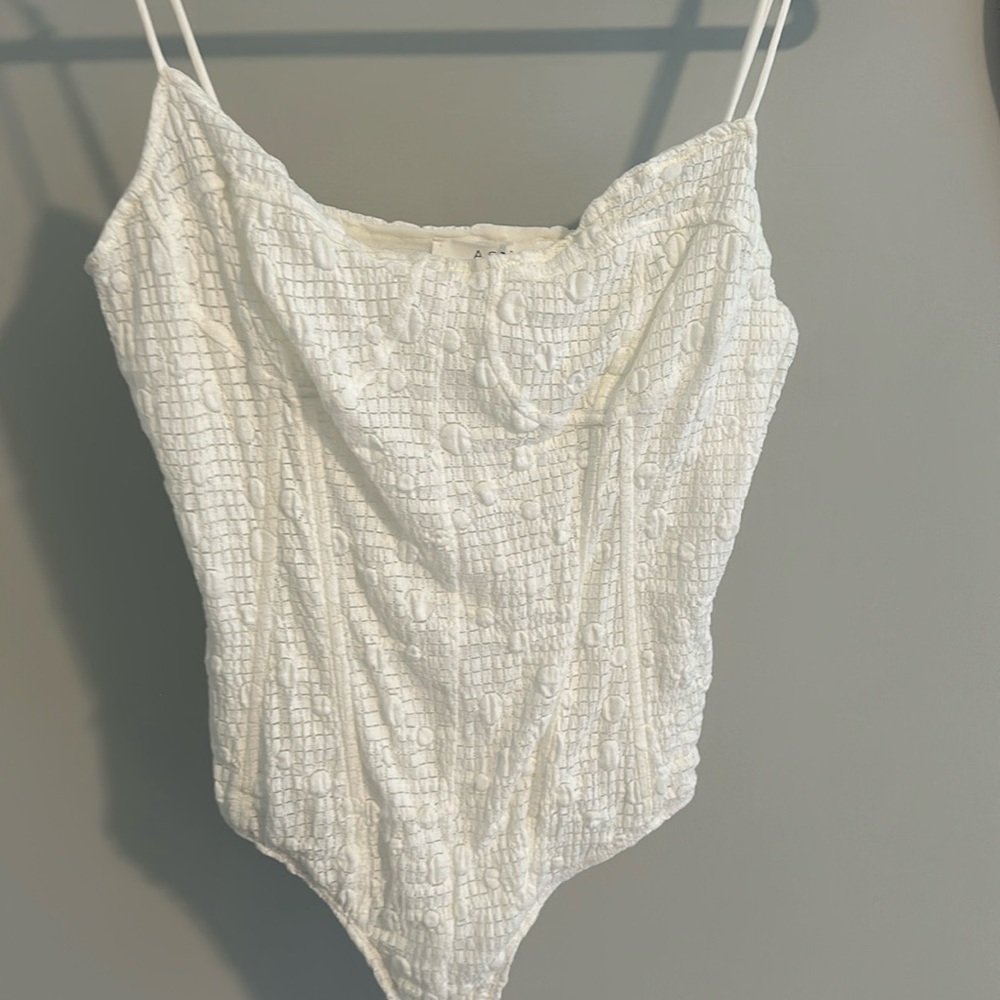 White polka dot bodysuit top ASTR the label large